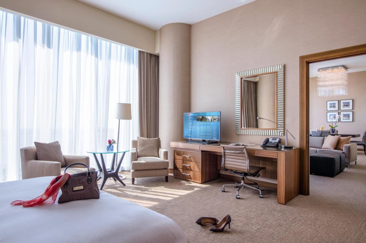 City Centre Rotana Doha Bagian luar foto Suite